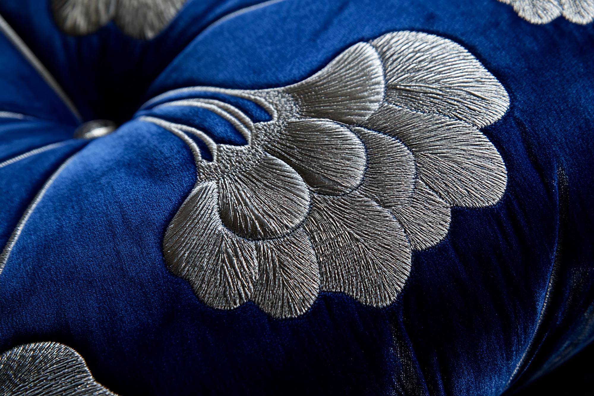 close-up of embroidered motif with layered satin stitch
